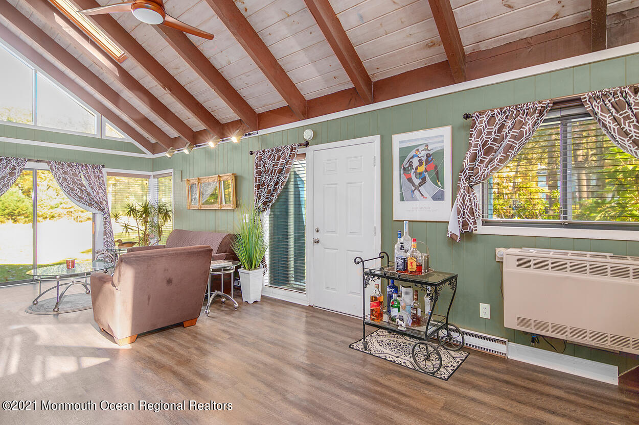 308 New Road Montague, NJ 07827 - Photo 9 of 27 a living room with furniture and a wooden floor