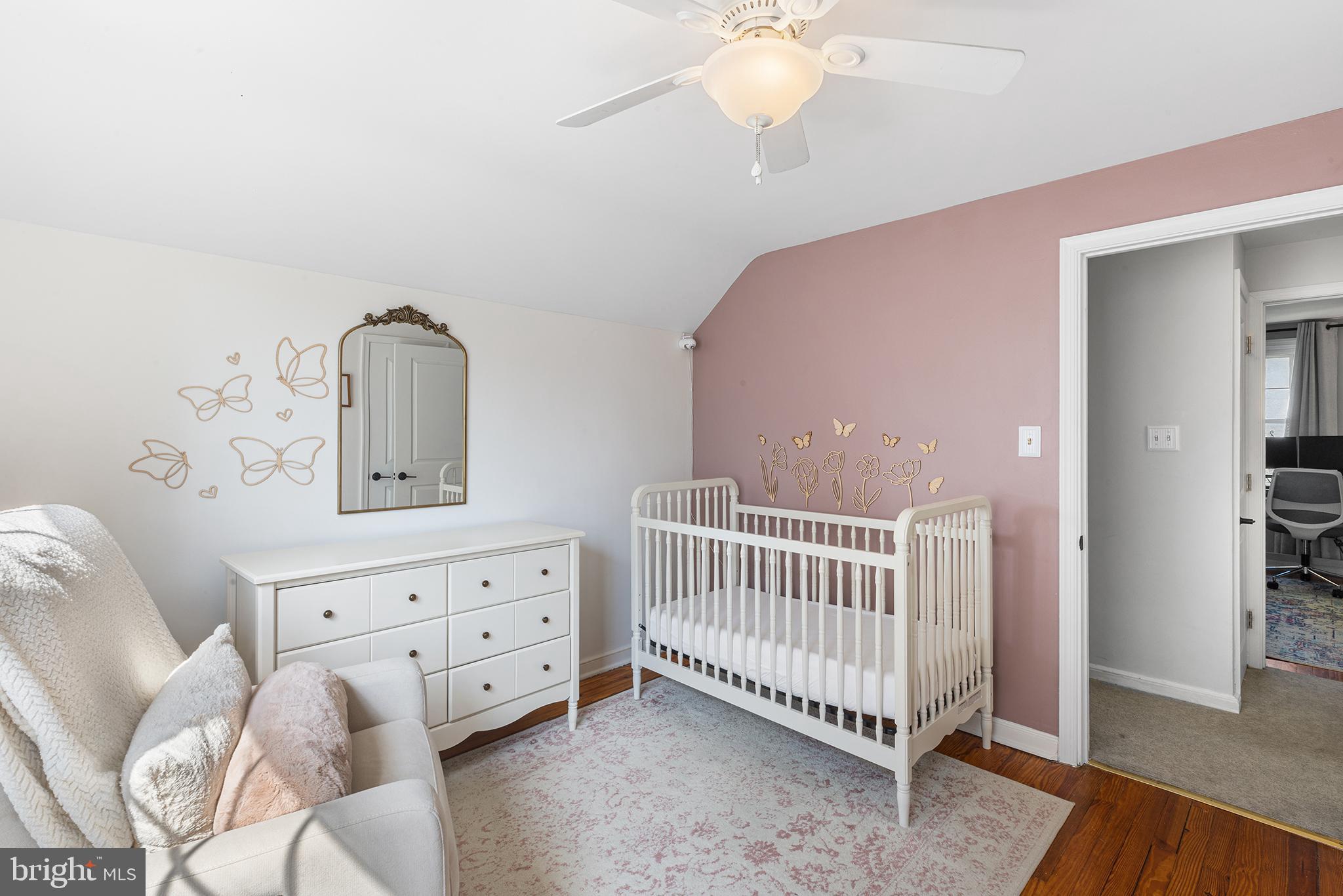 607 Darby Road Havertown, PA 19083 - Photo 20 of 26 a view of a bedroom with furniture and wooden floor