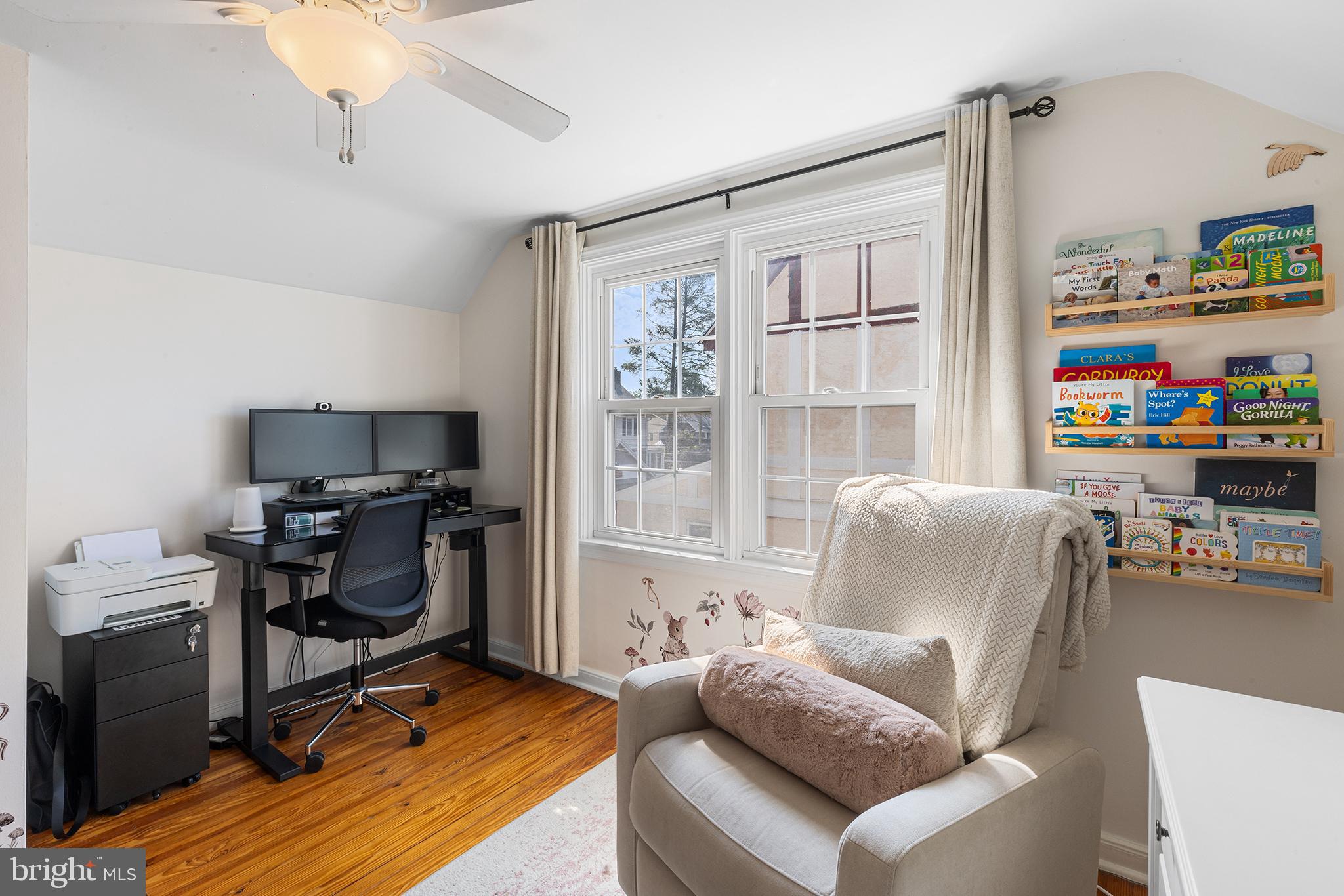 607 Darby Road Havertown, PA 19083 - Photo 21 of 26 a work room with furniture and a flat screen tv