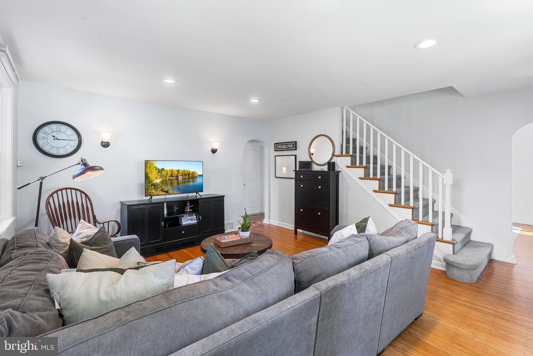 607 Darby Road Havertown, PA 19083 - Photo 5 of 26 a living room with furniture and a fireplace