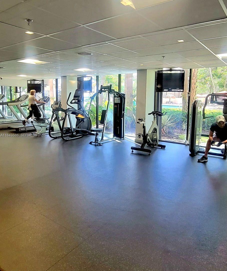 540 Brickell Key Drive, Unit 307 Miami, FL 33131 - Photo 26 of 29 a view of a room with gym equipment