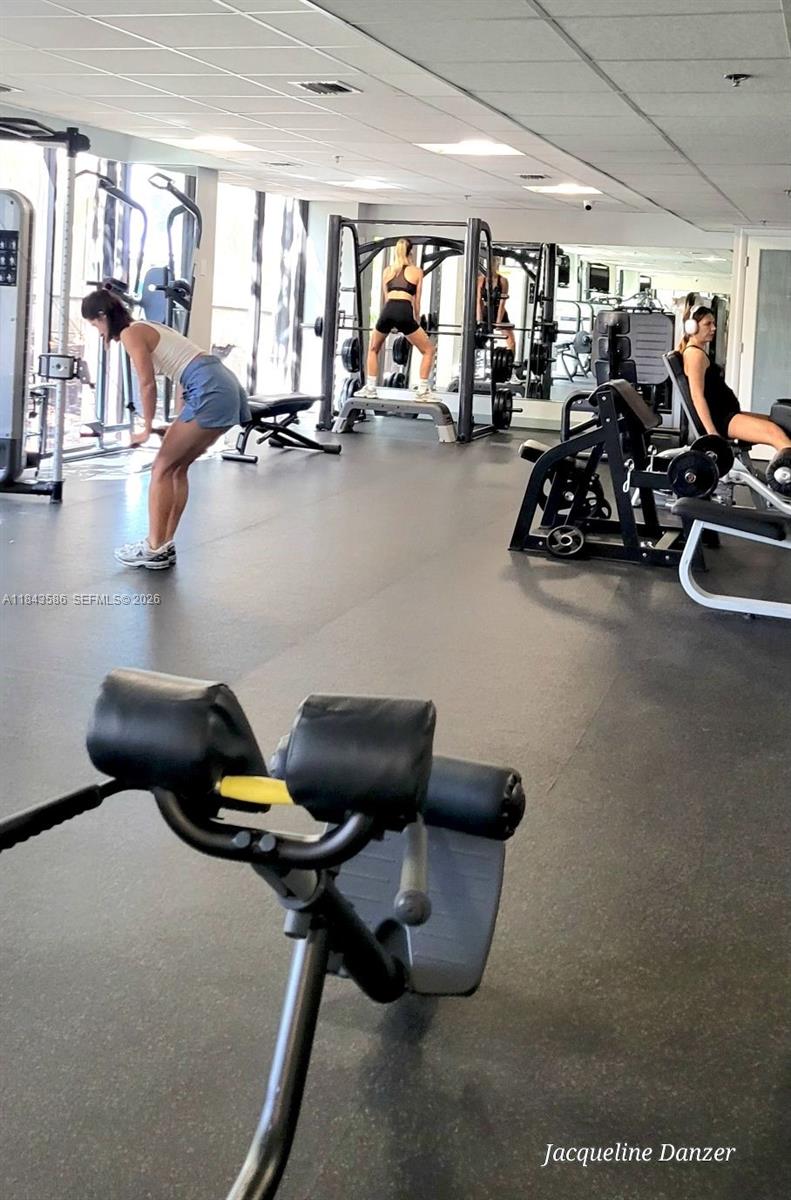 540 Brickell Key Drive, Unit 307 Miami, FL 33131 - Photo 27 of 29 a view of a room with gym equipment