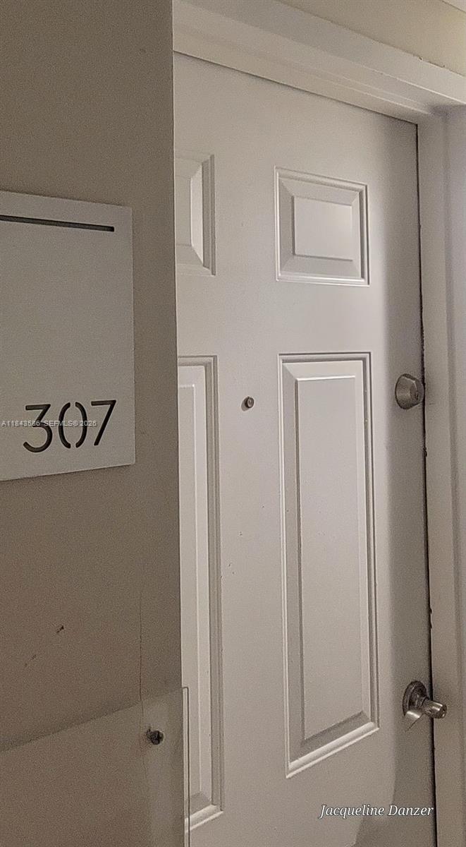 540 Brickell Key Drive, Unit 307 Miami, FL 33131 - Photo 4 of 29 a bathroom with a shower and a sink