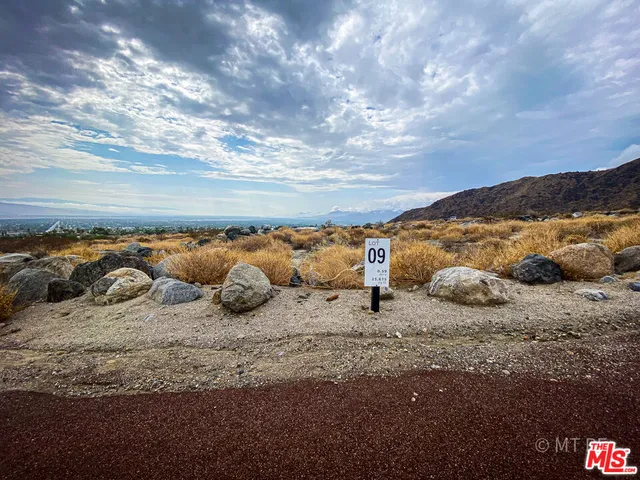 a view of mountain with sunset