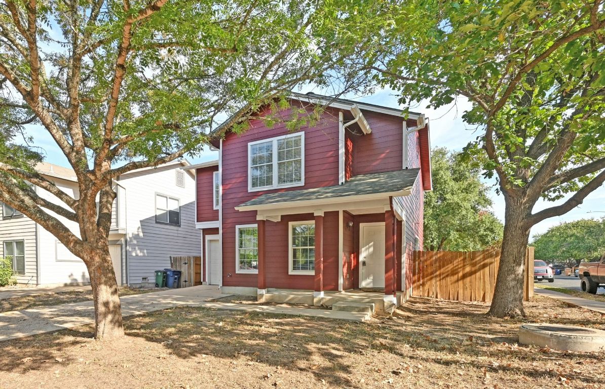 1400 Geoffs Drive Austin, TX 78748 - Photo 1 of 1 a front view of a house with a tree