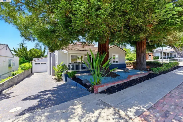 a house view with a garden space
