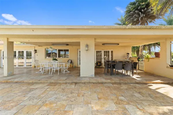 a outdoor dining space with furniture