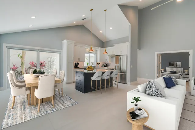 a kitchen that has a sink and a stove