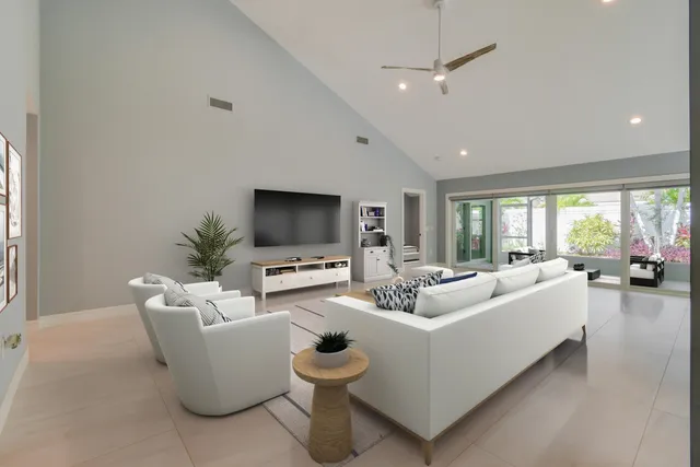a kitchen with granite countertop a refrigerator and a stove
