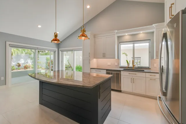 a spacious bathroom with a double vanity sink mirror and shower
