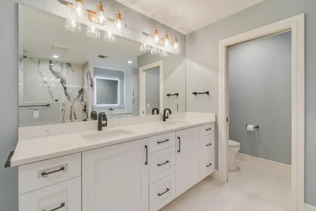 a view of a path along with potted plants