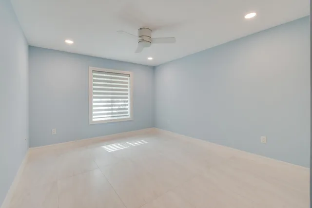 a sign that is sitting on a wooden floor