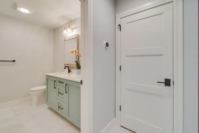 a view of a backyard with swimming pool