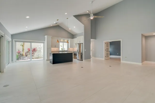 a kitchen with counter top space and refrigerator