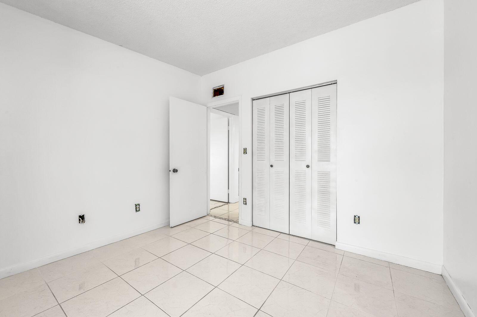 9743 West McNab Road, Unit 209 Tamarac, FL 33321 - Photo 16 of 22 a view of an empty room