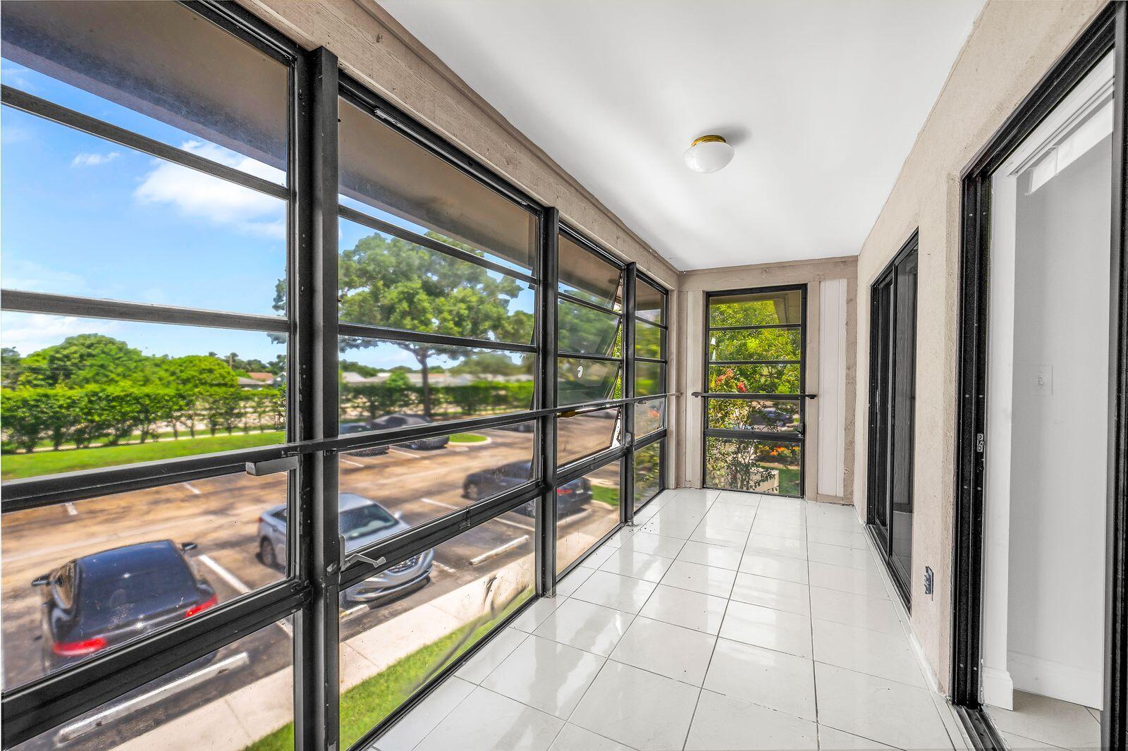 9743 West McNab Road, Unit 209 Tamarac, FL 33321 - Photo 19 of 22 a view of a room with window