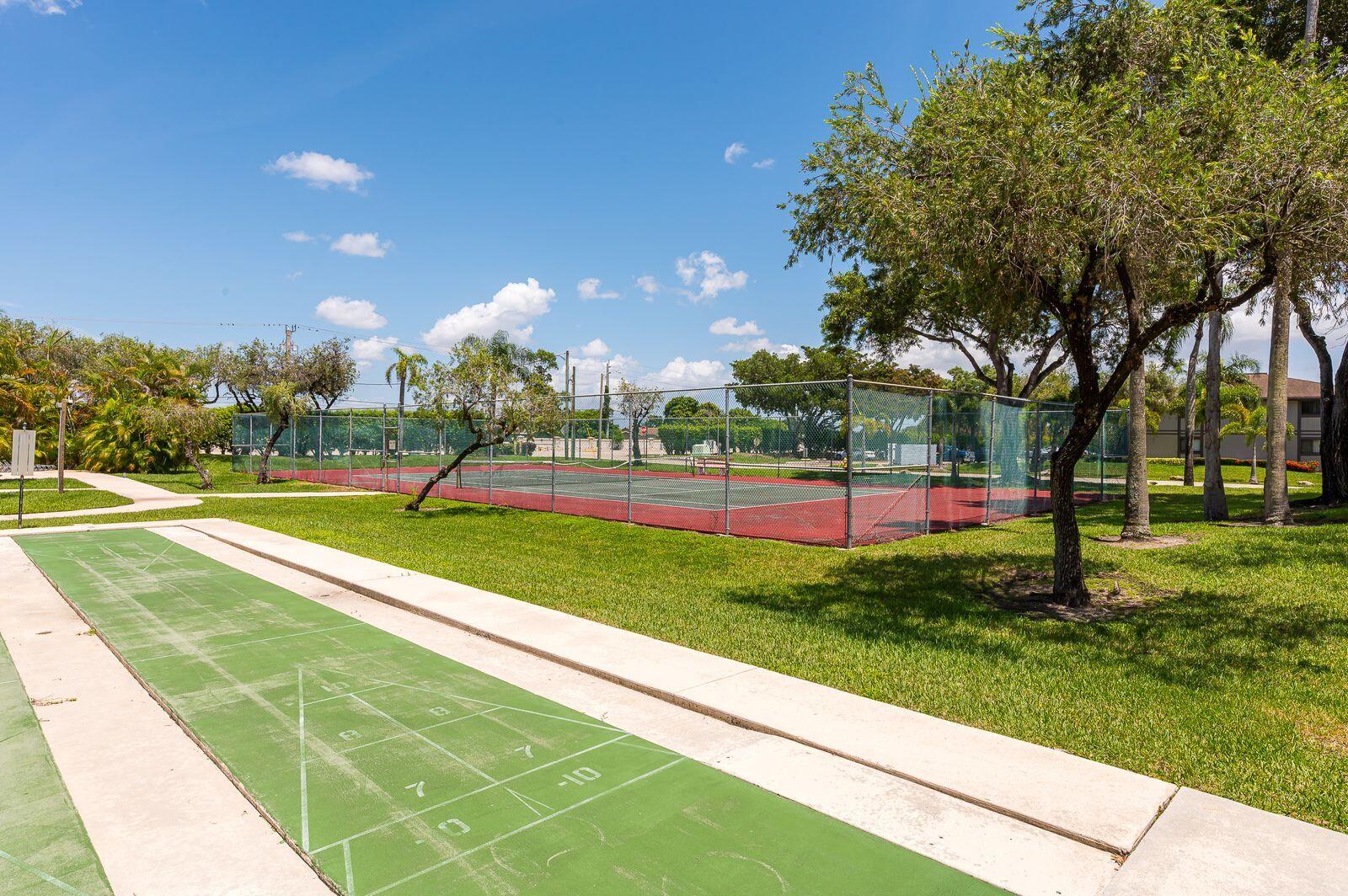 9743 West McNab Road, Unit 209 Tamarac, FL 33321 - Photo 21 of 22 a view of a park