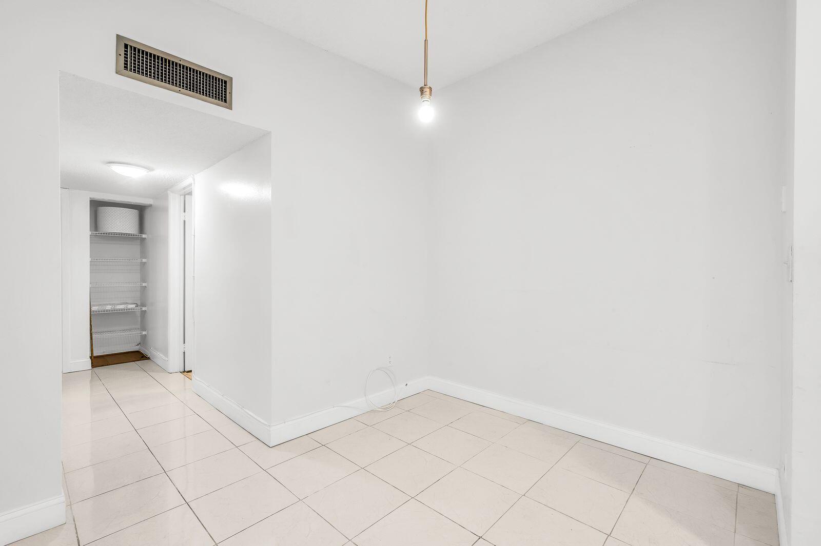 9743 West McNab Road, Unit 209 Tamarac, FL 33321 - Photo 9 of 22 a view of an empty room