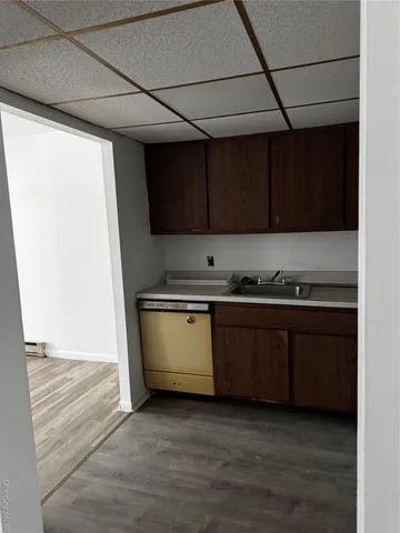 a kitchen with a sink and a stove