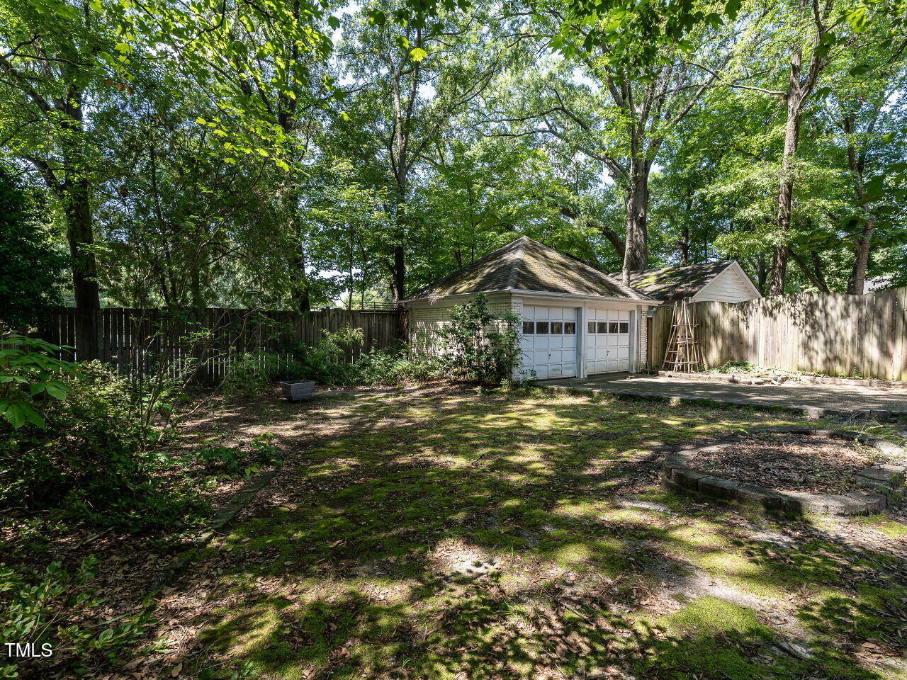 2715 Vanderbilt Avenue Raleigh, NC 27607 - Photo 27 of 36 a house view with a trees
