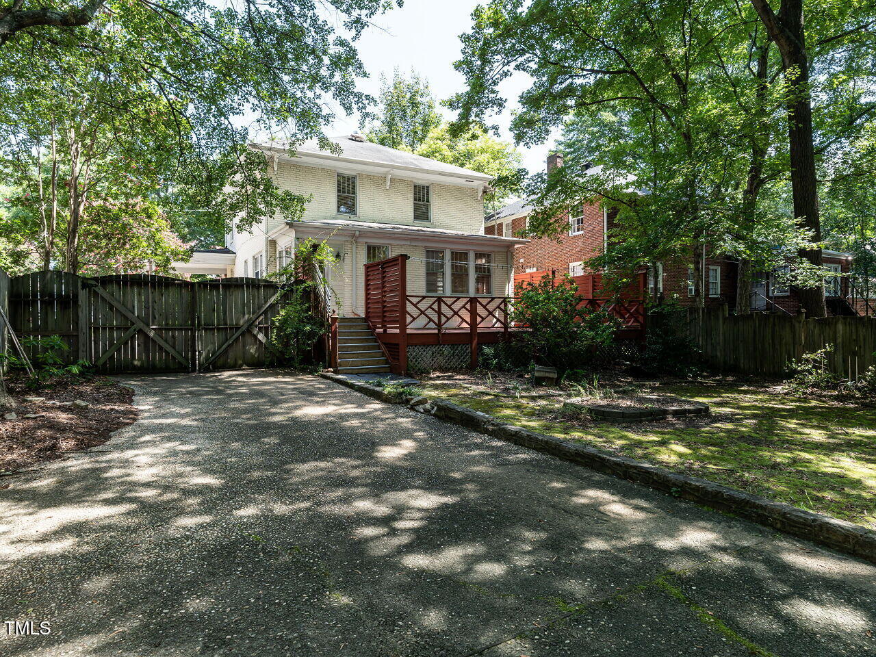 2715 Vanderbilt Avenue Raleigh, NC 27607 - Photo 30 of 36 a view of a house with backyard and trees