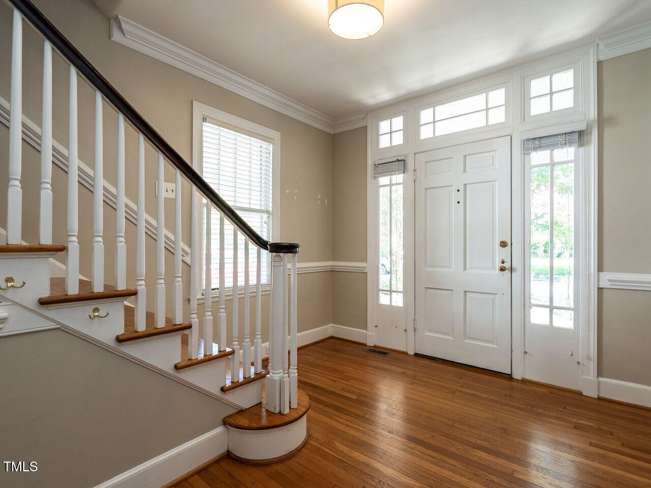 2715 Vanderbilt Avenue Raleigh, NC 27607 - Photo 4 of 36 a view of entryway and hall with wooden floor