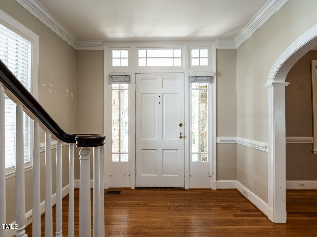 2715 Vanderbilt Avenue Raleigh, NC 27607 - Photo 5 of 36 a view of an entryway with wooden floor and staircase