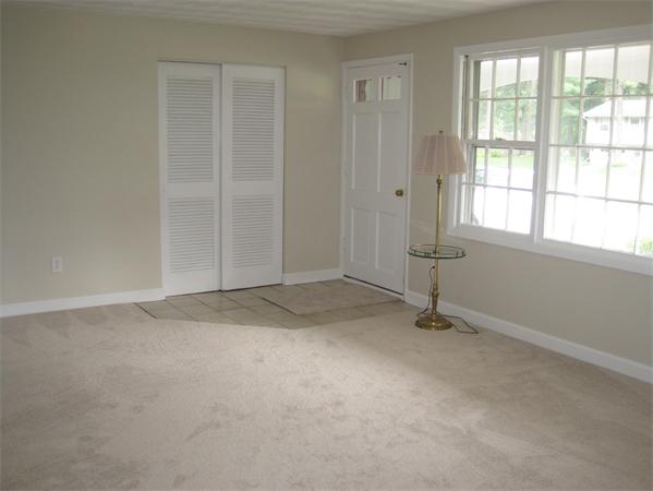 23 Porter Road Chelmsford, MA 01824 - Photo 13 of 21 an empty room with a empty space and a window