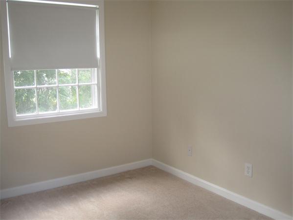 23 Porter Road Chelmsford, MA 01824 - Photo 14 of 21 an empty room with a window