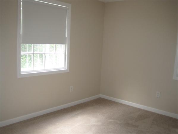 23 Porter Road Chelmsford, MA 01824 - Photo 16 of 21 an empty room with a window