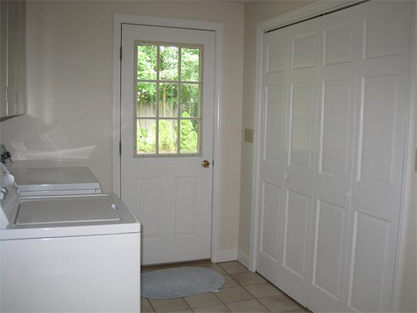 23 Porter Road Chelmsford, MA 01824 - Photo 17 of 21 a utility room with dryer and washer