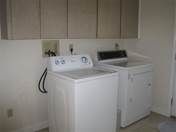 23 Porter Road Chelmsford, MA 01824 - Photo 18 of 21 a utility room with dryer and washer