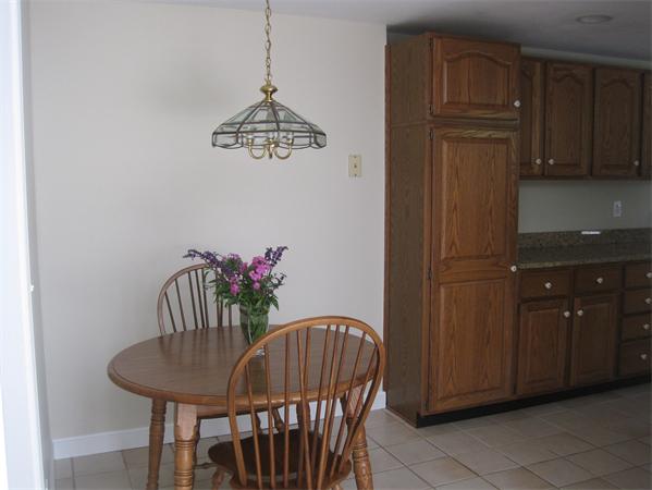 23 Porter Road Chelmsford, MA 01824 - Photo 8 of 21 a view of a dining room with furniture
