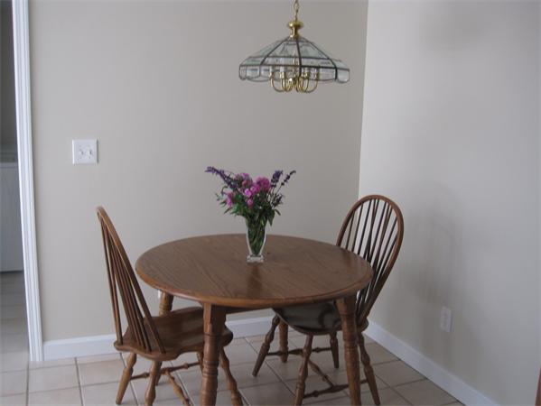 23 Porter Road Chelmsford, MA 01824 - Photo 9 of 21 a view of a dining room with furniture and wooden floor