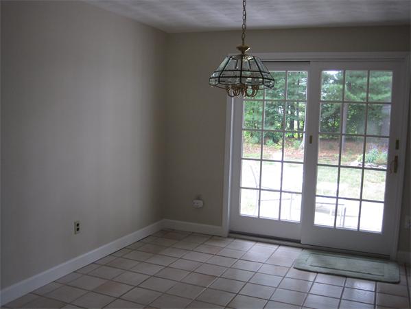 23 Porter Road Chelmsford, MA 01824 - Photo 10 of 21 a view of an empty room and window
