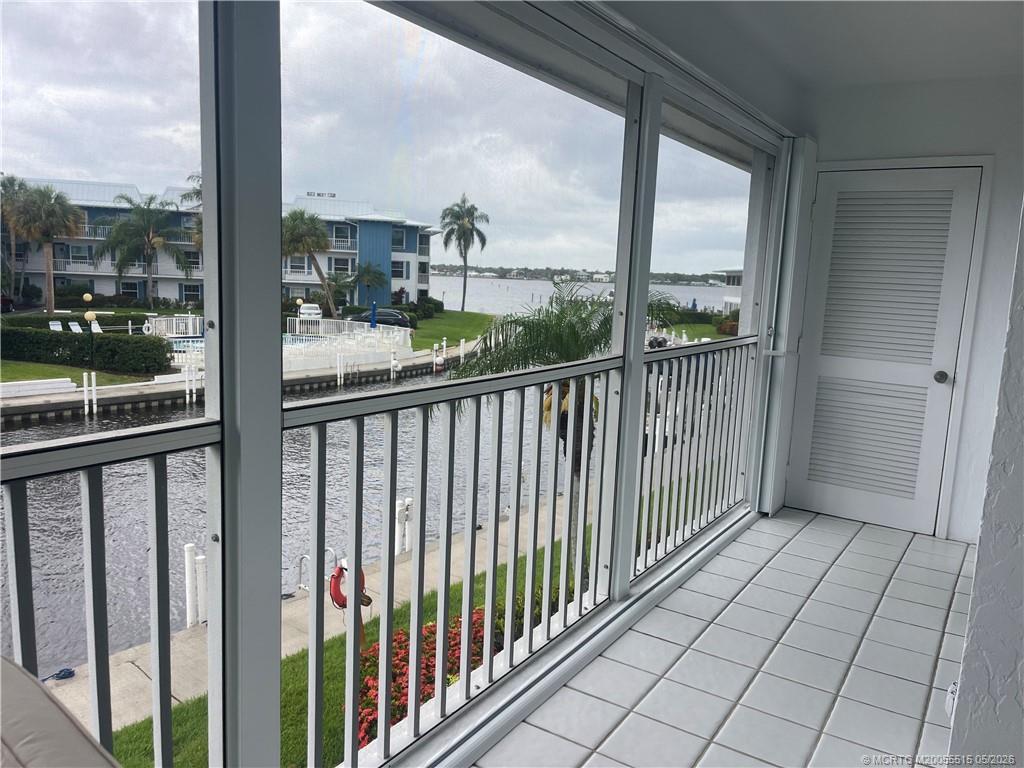 1858 Southwest Palm City Road, Unit 203 Stuart, FL 34994 - Photo 2 of 21 a view of a balcony with city view