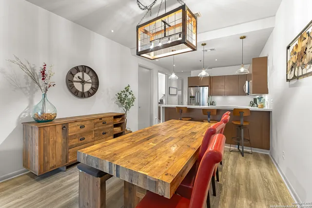 a open kitchen with a table and chairs