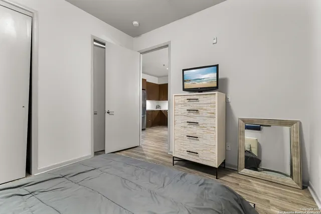 a view of walk in closet with furniture