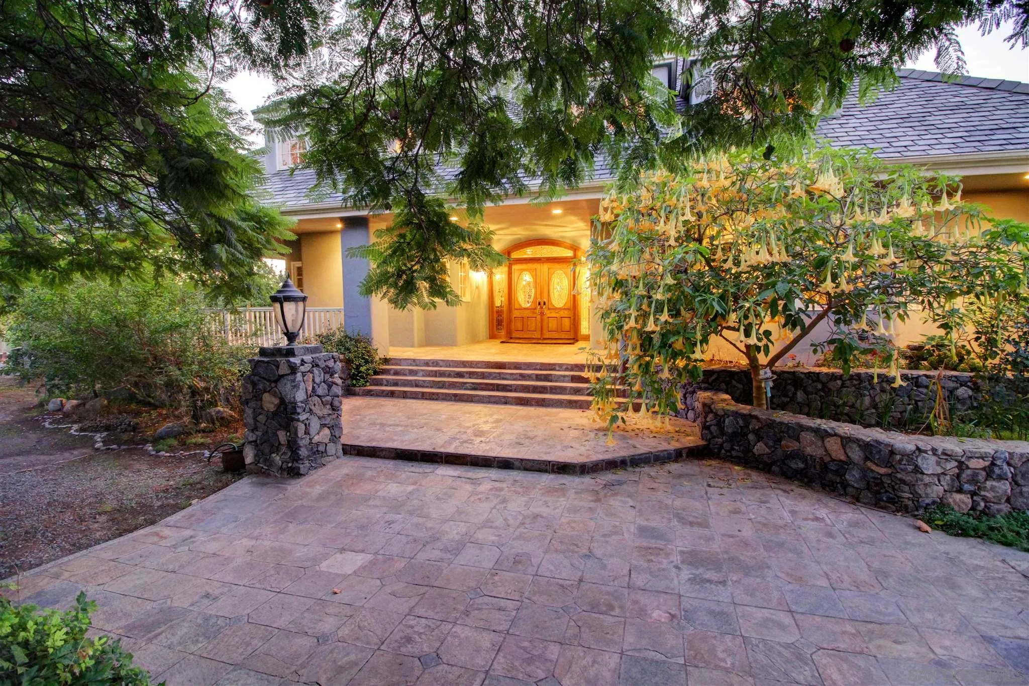 15245 Presilla Drive Jamul, CA 91935 - Photo 11 of 57 a view of a house with backyard and a tree