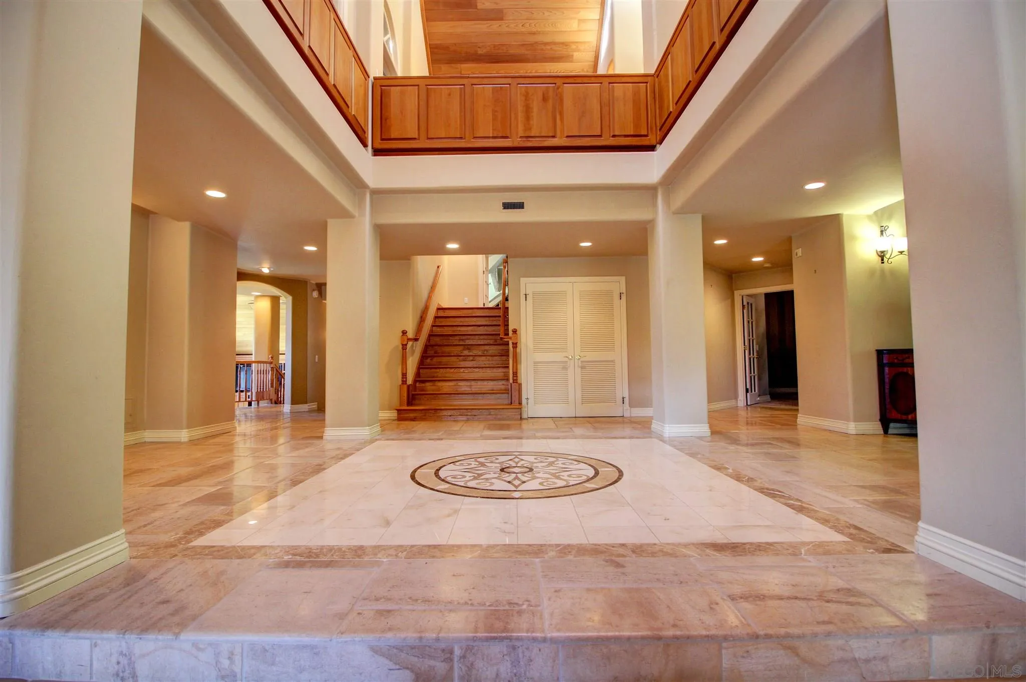 15245 Presilla Drive Jamul, CA 91935 - Photo 13 of 57 a view of a hallway with a couch and a potted plant