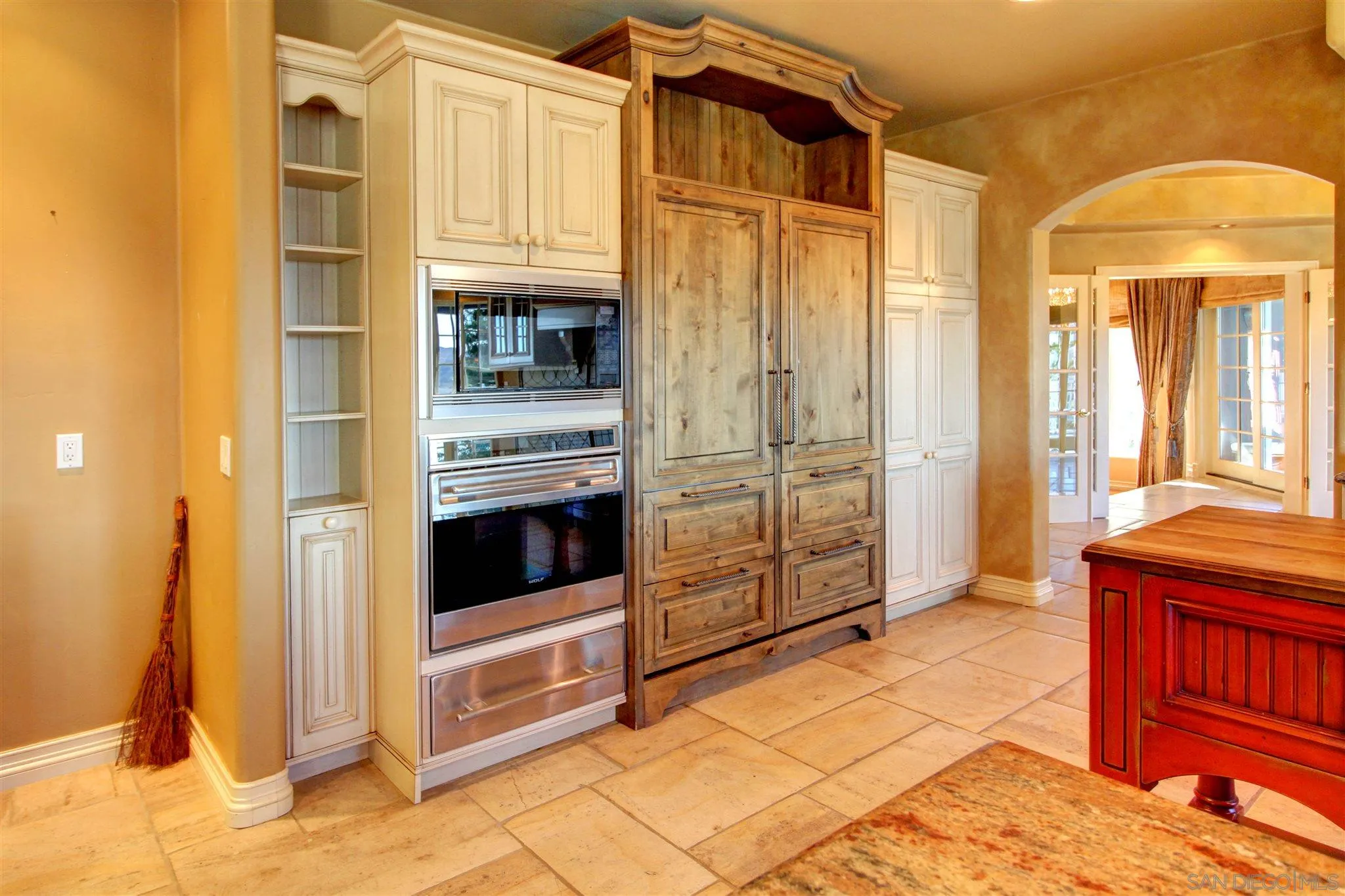 15245 Presilla Drive Jamul, CA 91935 - Photo 14 of 57 a kitchen with stainless steel appliances granite countertop a refrigerator and a stove top oven
