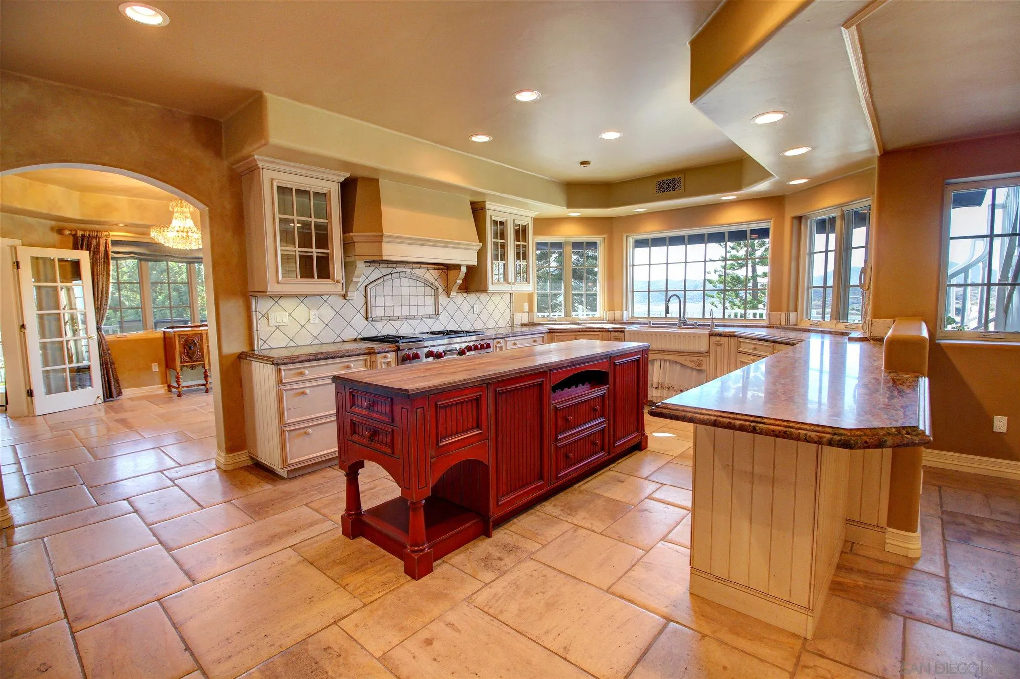15245 Presilla Drive Jamul, CA 91935 - Photo 15 of 57 a kitchen with stainless steel appliances granite countertop a stove a sink dishwasher and a refrigerator