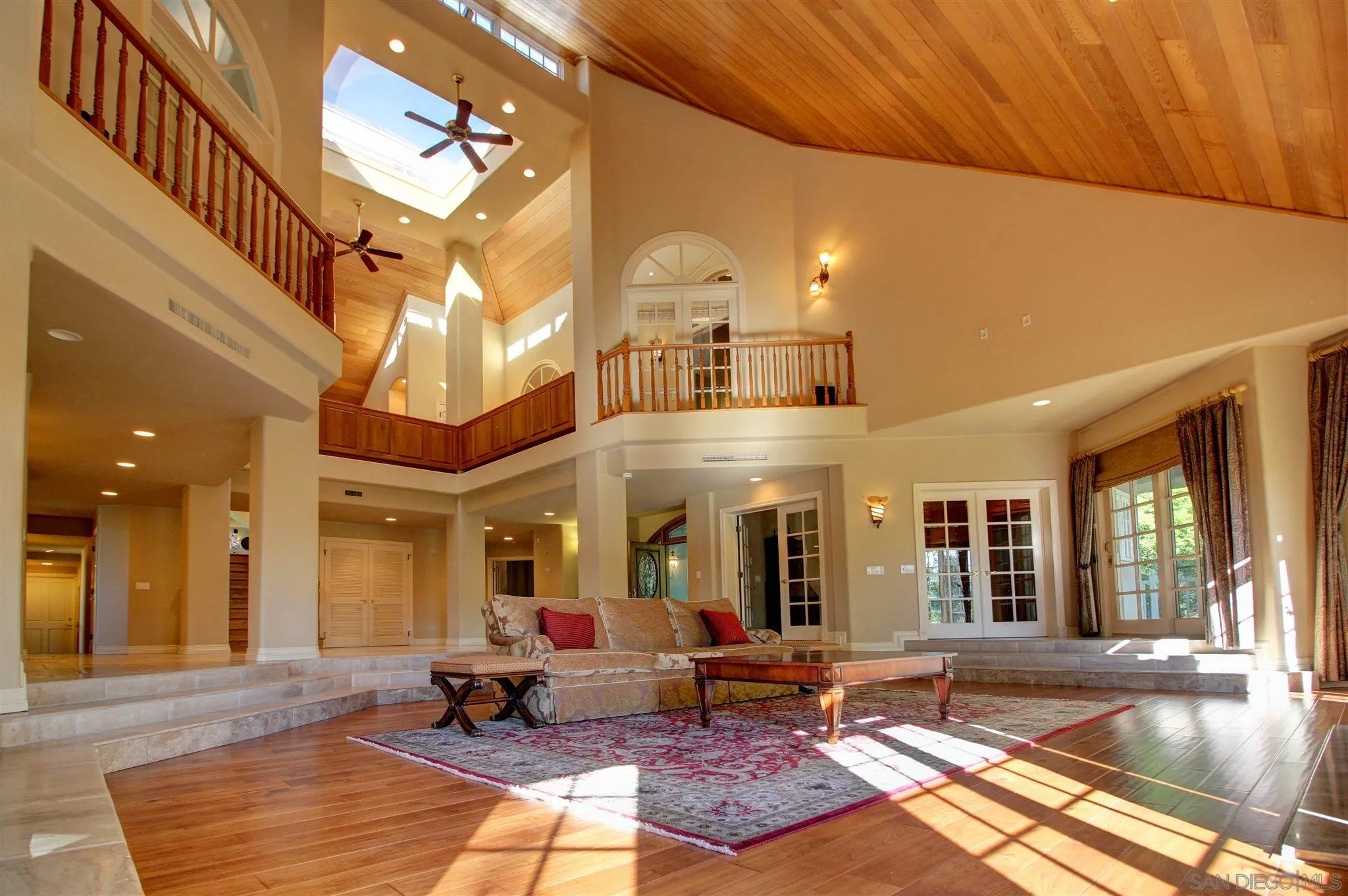 15245 Presilla Drive Jamul, CA 91935 - Photo 25 of 57 a living room with fireplace furniture and a rug