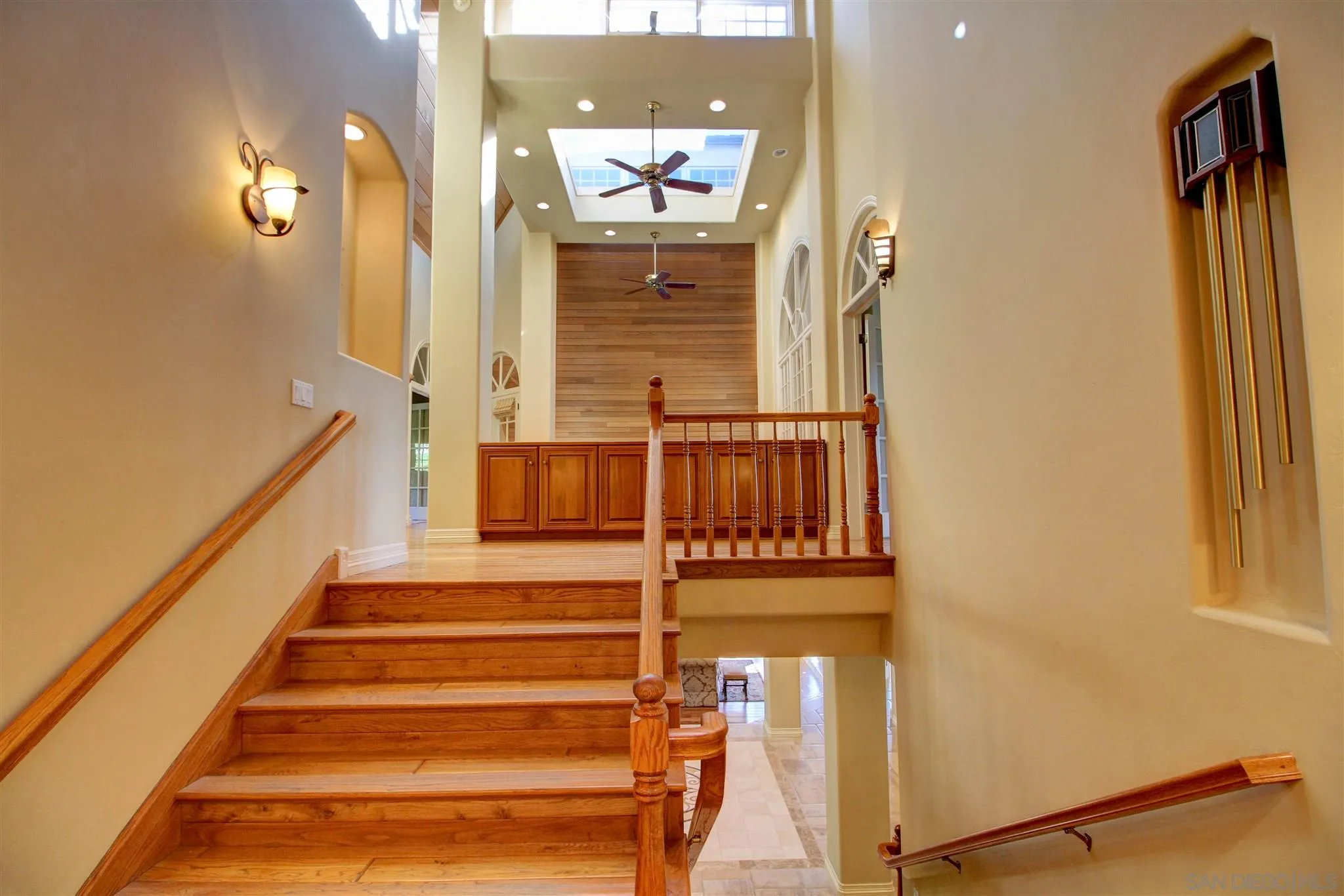 15245 Presilla Drive Jamul, CA 91935 - Photo 30 of 57 a view of a hallway with wooden floor and entryway