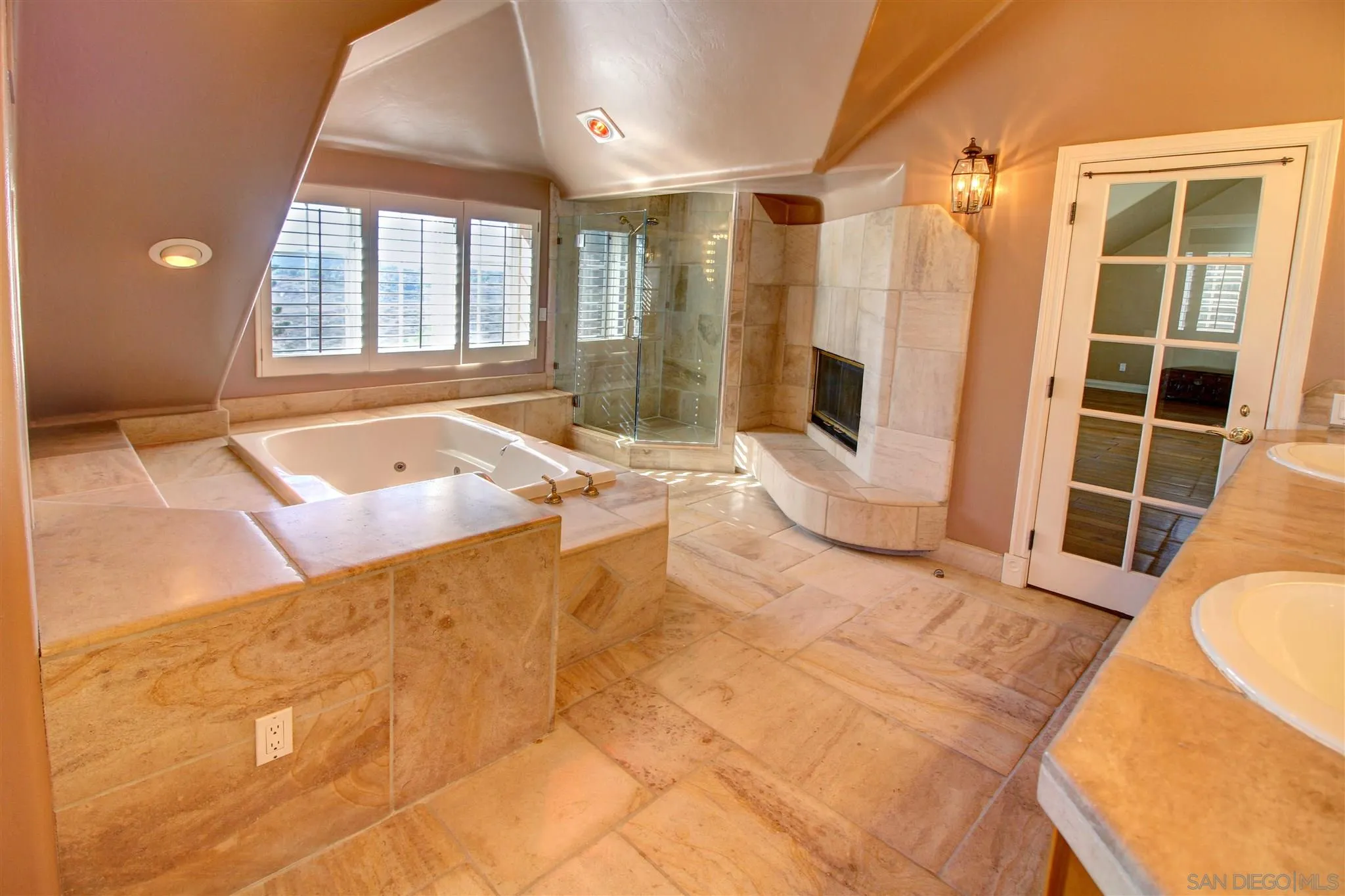 15245 Presilla Drive Jamul, CA 91935 - Photo 36 of 57 a bathroom with a tub a sink and a shower