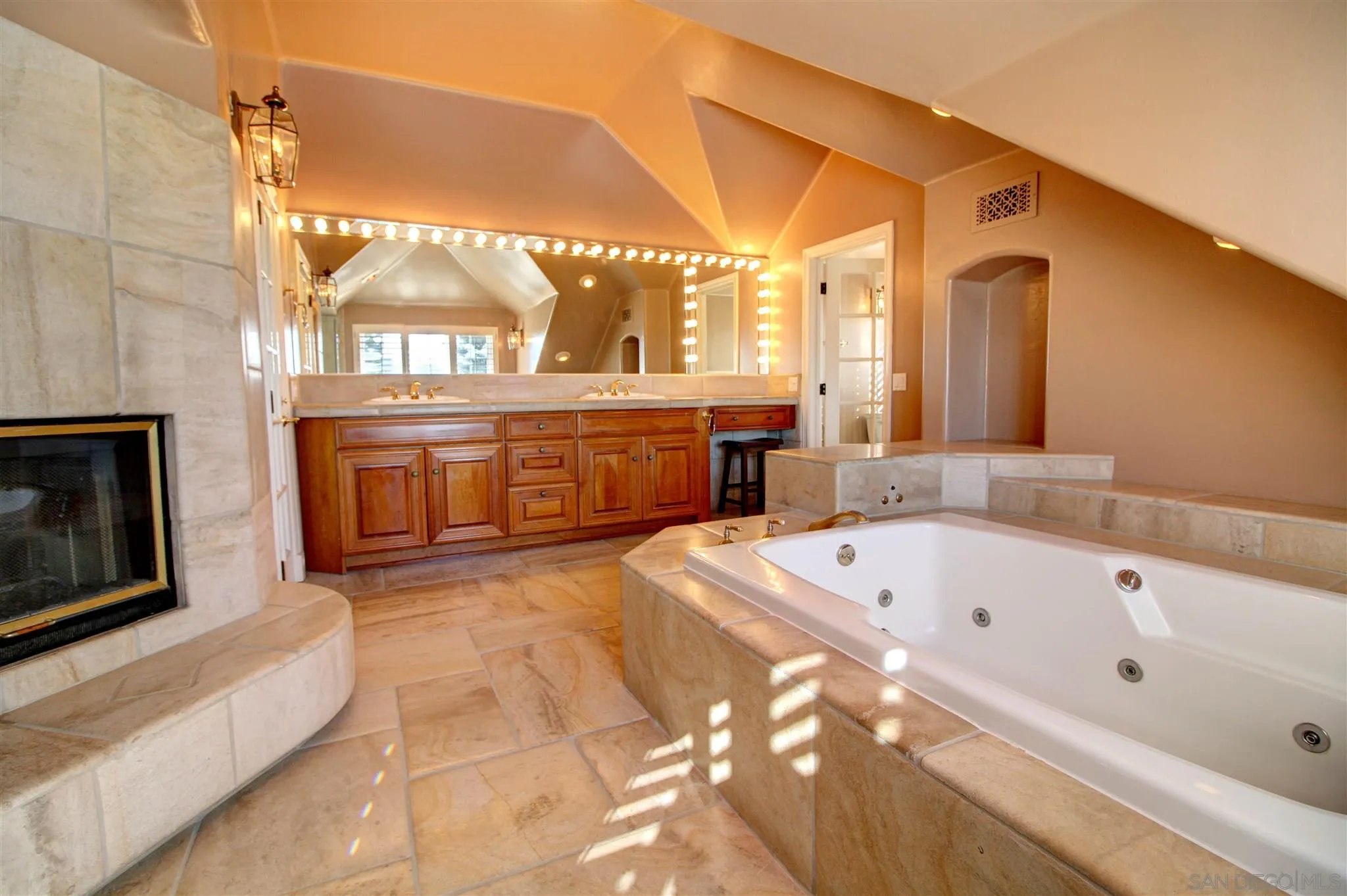 15245 Presilla Drive Jamul, CA 91935 - Photo 37 of 57 a spacious bathroom with a tub sink and mirror