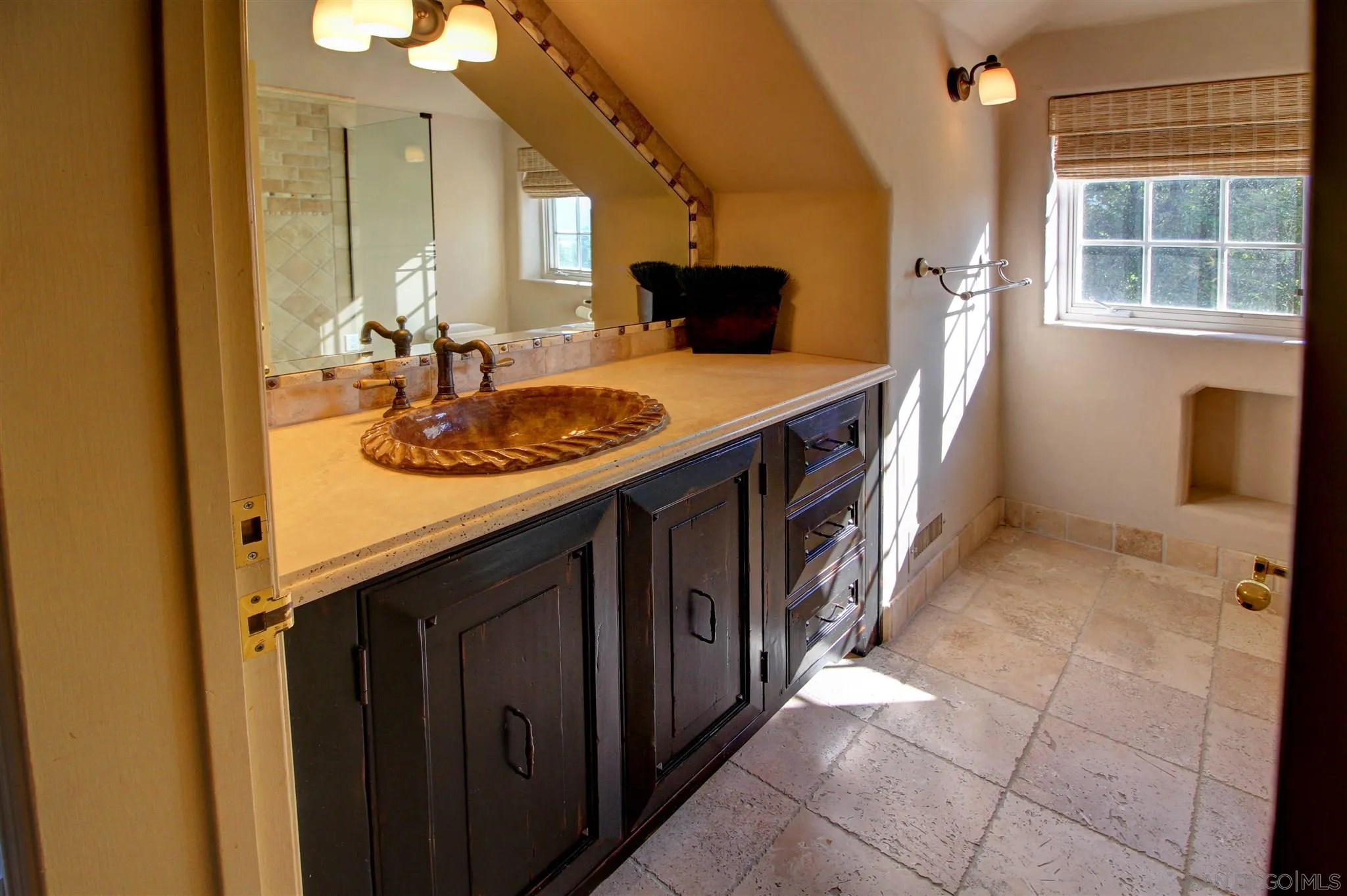 15245 Presilla Drive Jamul, CA 91935 - Photo 41 of 57 a en suite bathroom with a sink and a mirror