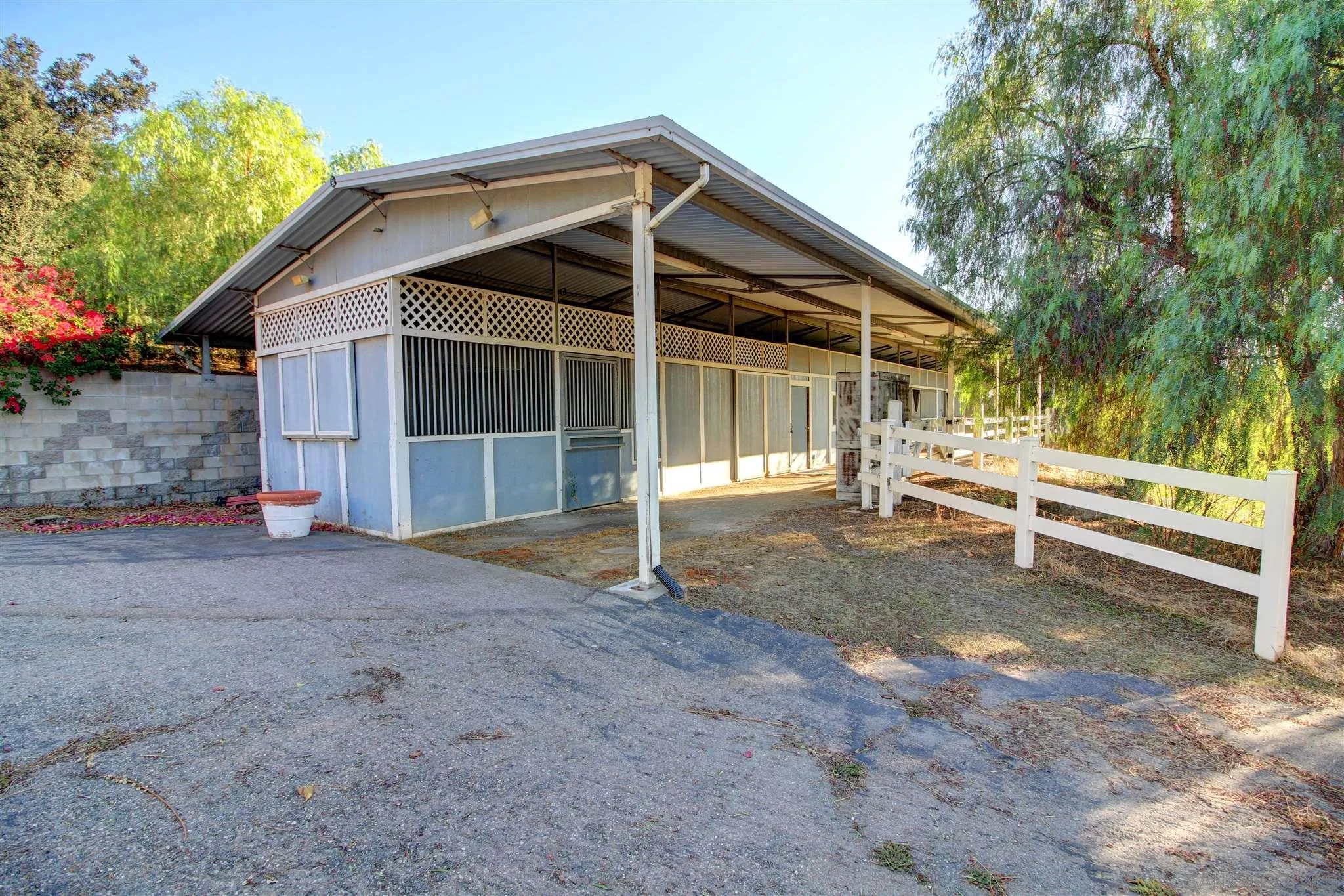 15245 Presilla Drive Jamul, CA 91935 - Photo 49 of 57 a view of house with backyard and trees in the background