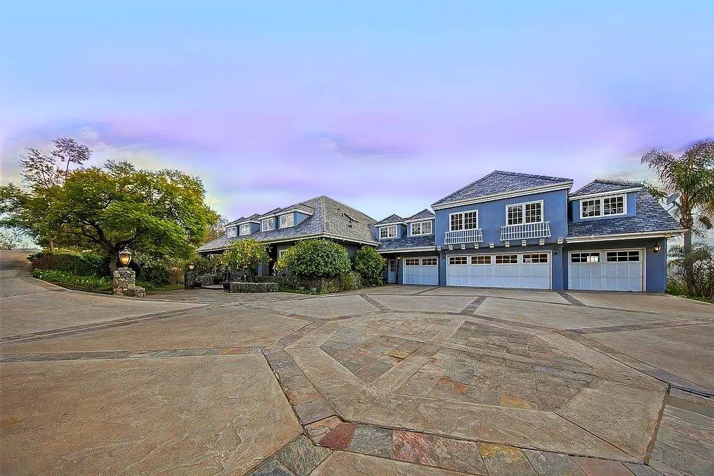 15245 Presilla Drive Jamul, CA 91935 - Photo 52 of 57 a front view of a house with yard and trees in the background