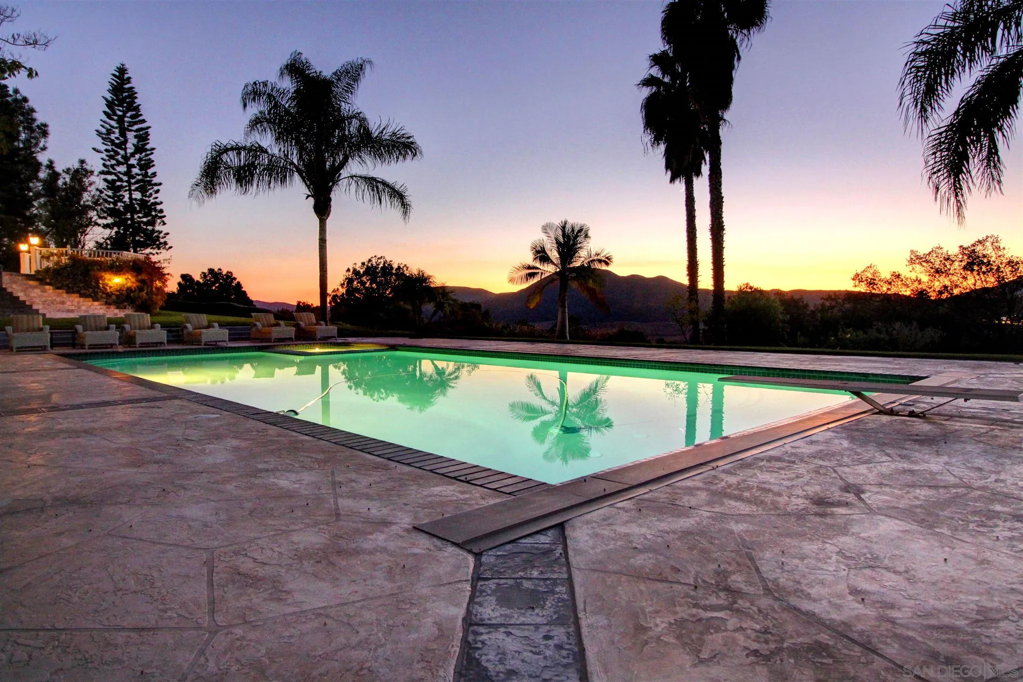 15245 Presilla Drive Jamul, CA 91935 - Photo 9 of 57 a view of swimming pool with a yard and palm trees